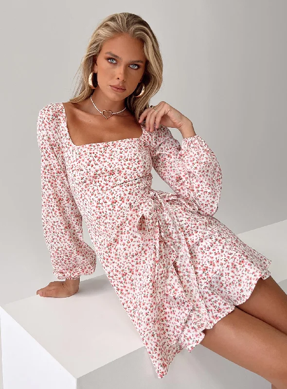 Mini dresses with pleated skirts for a classic look The Villa Mini Dress Floral