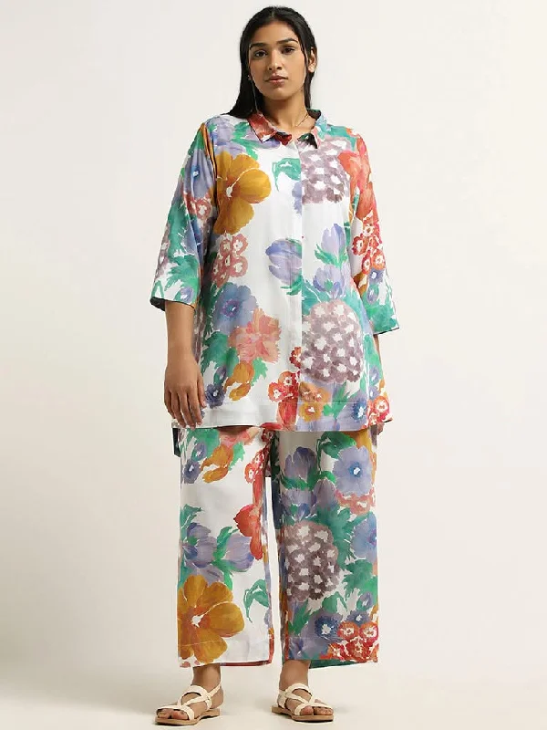 Women's designer brand pants High - rise flare women jeans for a 70s - inspired look Diza Blue Floral Printed Tunic Women's designer brand pants High - rise flare women jeans for a 70s - inspired look Diza Blue Floral Printed Tunic