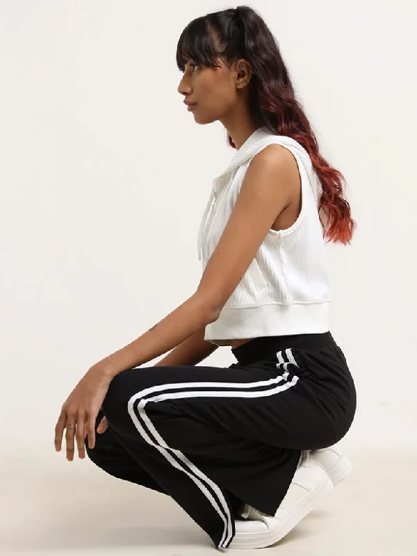 Women's pants for office meetings High - waisted women jeans for a flattering silhouette Studiofit Black Striped Cotton Track Pants Women's pants for office meetings High - waisted women jeans for a flattering silhouette Studiofit Black Striped Cotton Track Pants