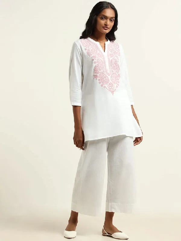 Women's pants for garden parties Colored women jeans in vibrant hues like red and yellow Utsa White Embroidered Kurti Women's pants for garden parties Colored women jeans in vibrant hues like red and yellow Utsa White Embroidered Kurti