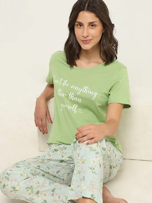 Women's kids - inspired printed pants Colored women jeans in vibrant hues like red and yellow Wunderlove Green Printed Cotton T-Shirt
