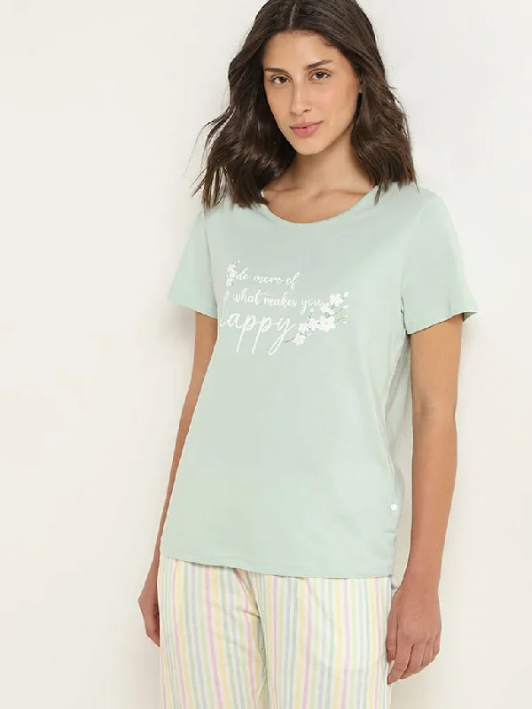 Women's pants for outdoor adventures Dark - wash women jeans for a sophisticated and slimming effect Wunderlove Light Green Printed Cotton T-Shirt
